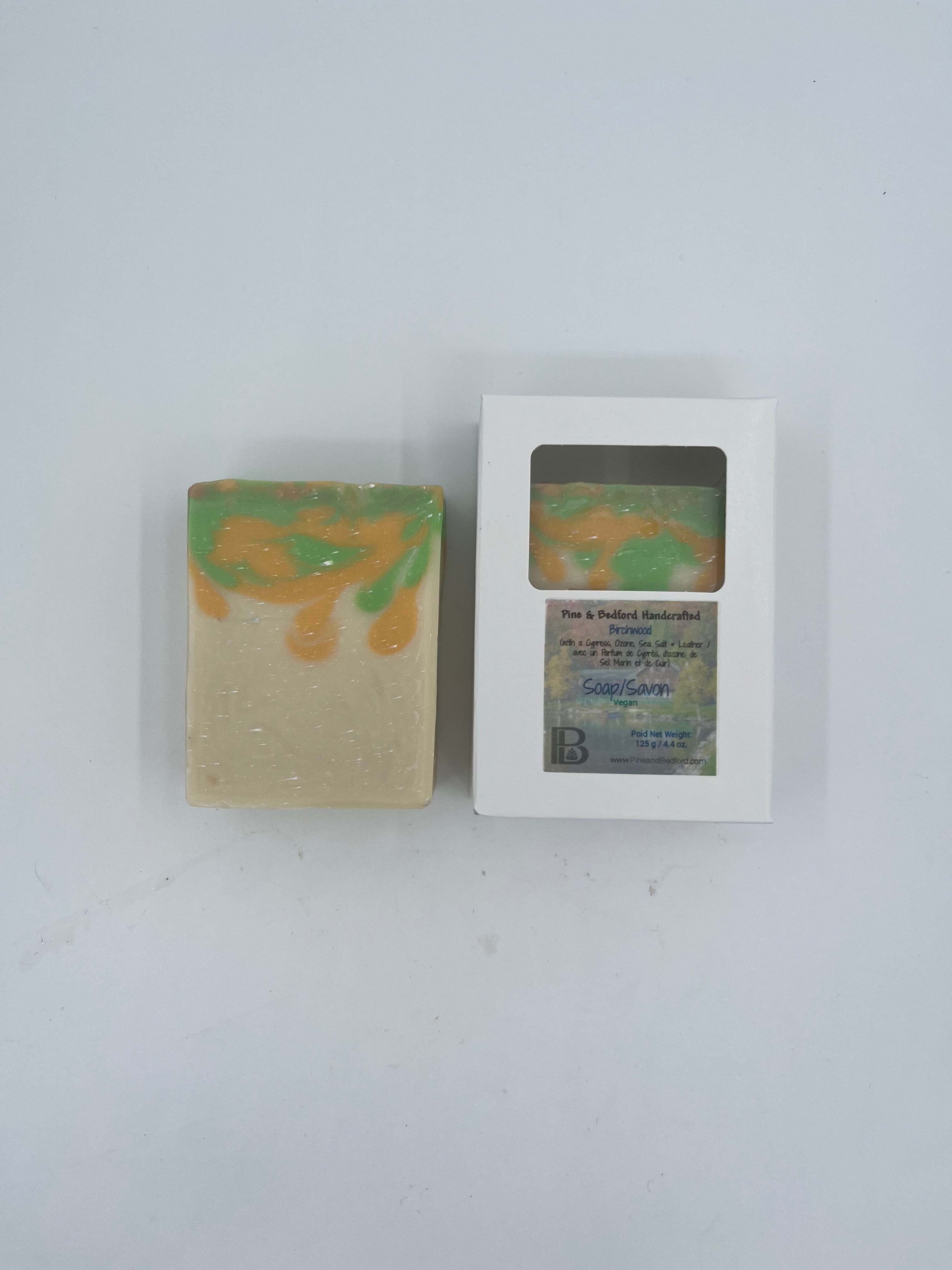Pine and Bedford's Birchwood Soap is lightly fragranced and smells like a complex mix of wild cypress, lime, oud, and leather. With a after-shave scent this Extra Bubbles formula bar provides enough creamy bubble with which to shave. Shown here naked and boxed.