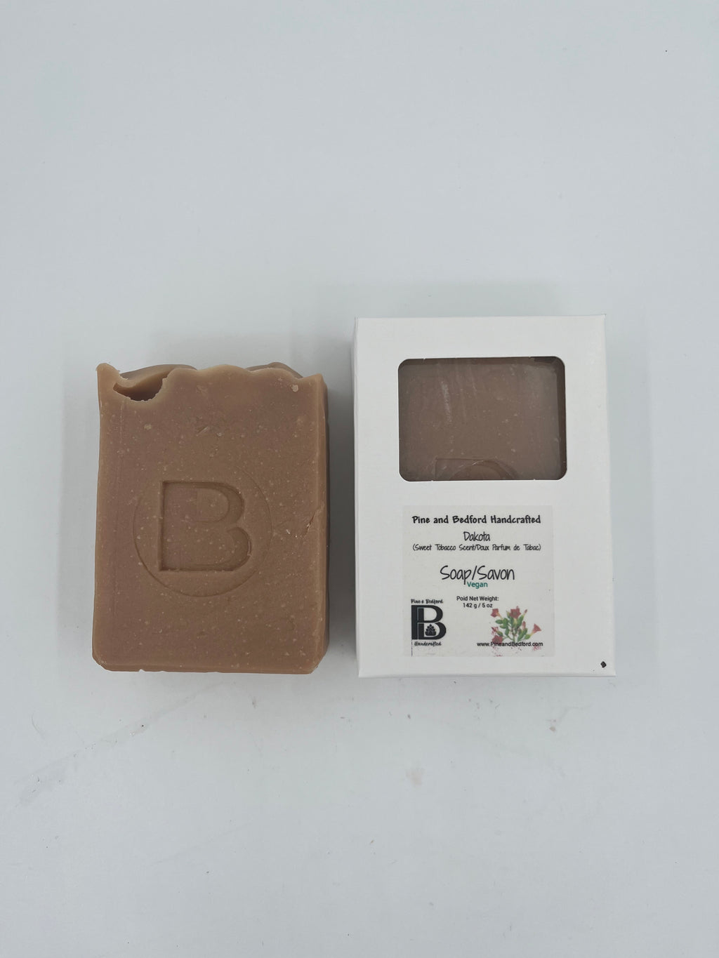Pine and Bedford's Dakota Soap Bars have a Wonderfully earthy scent of sweet tobacco flower, orange, vanilla and amber.  They are equally popular with men and women. Made from our Extra Bubbles Formula, there is enough creamy bubbles with which to shave. Shown here naked and boxed.