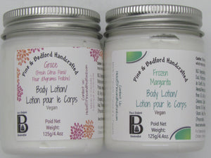 Pine and Bedford 4 oz jar of Body Lotion in two fragrance options - Grace (Fresh Citrus Floral) and Frozen Margarita (Lime)