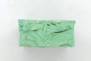 Pine and Bedford's Signature soap is a medium green with  a beautiful pine fragrance. The top is swirled in the spirit of a heavy bark.  (Top view shown here)