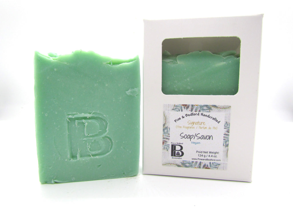 Pine and Bedford's Signature Pine Soap (size; Tall and Thin). A light green tall and thin sized soap. Shown here naked and boxed.
