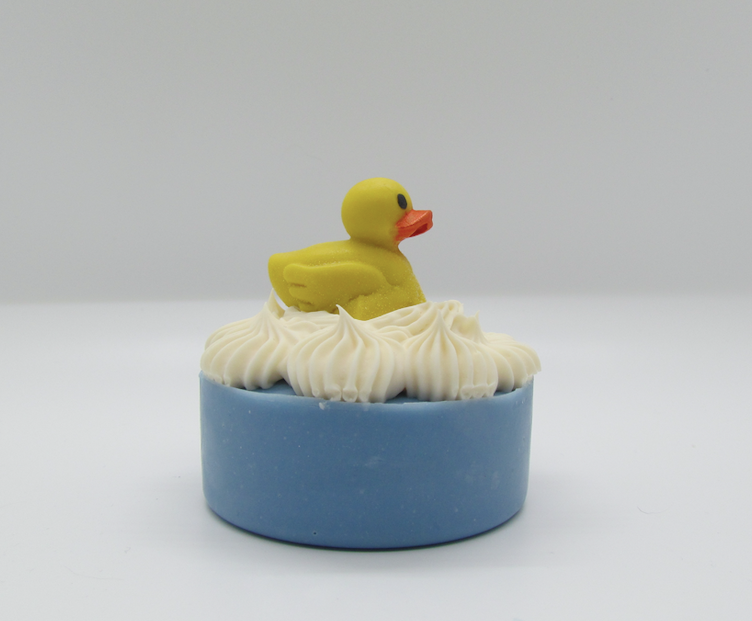 Pine and Bedford's Rubber Duckie 100% cold process soap with a Fruit Explosion fragrance.  Lots of fun at bath time. Shown naked.
